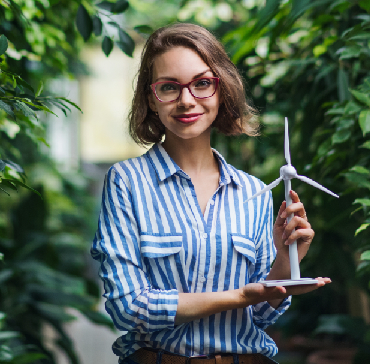 httpselements.envato.comyoung woman with windmill model standing in botani u88jwdy